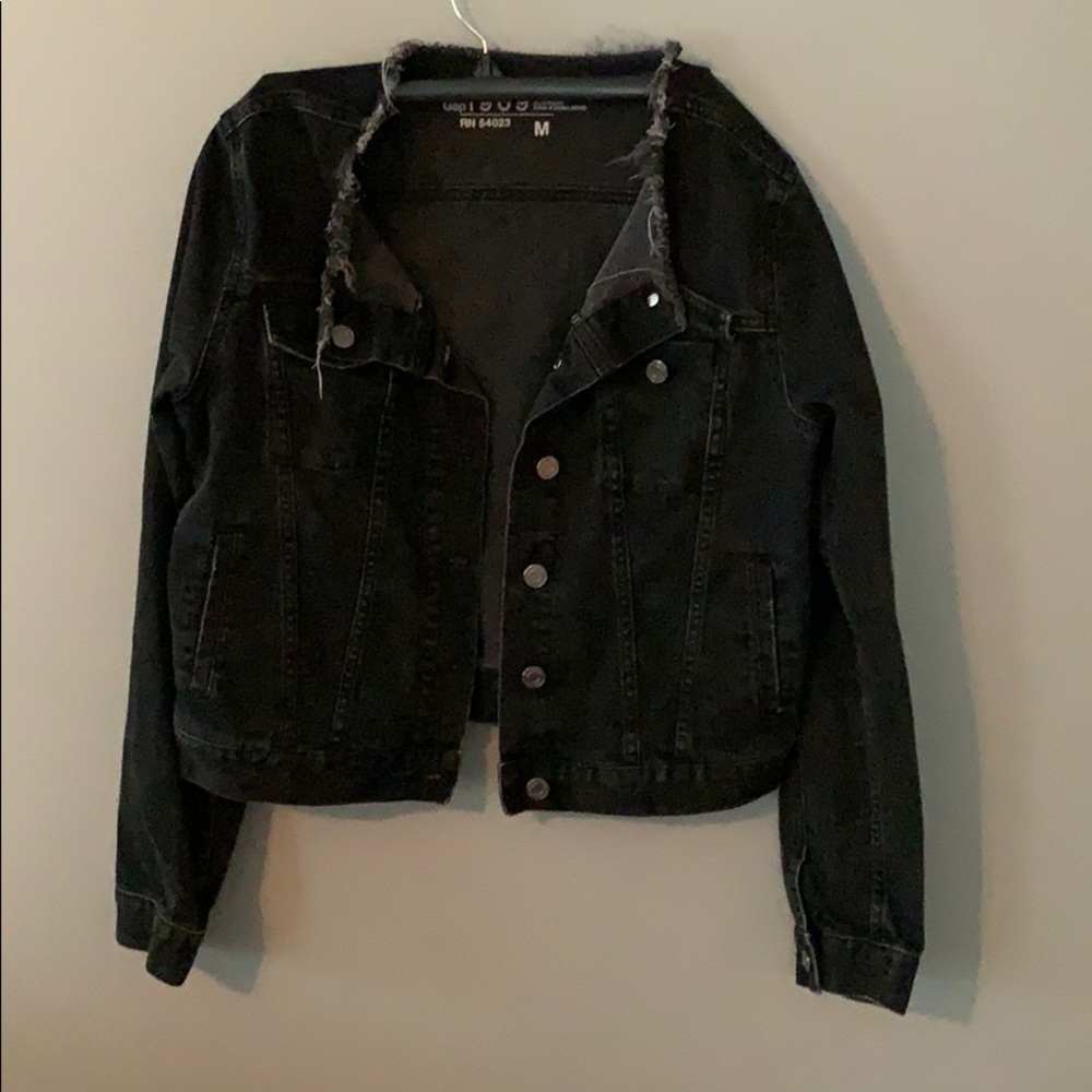 Distressed black jean jacket